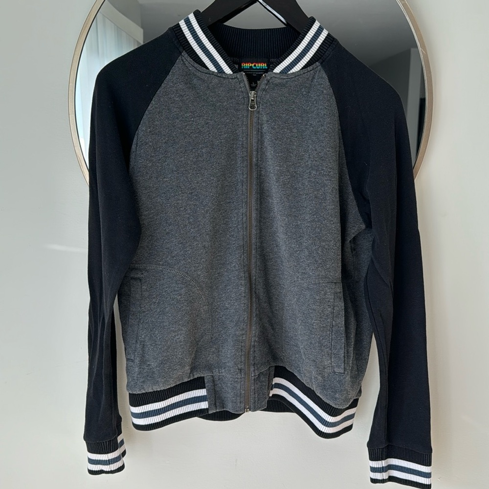 Rip Curl jacket sz L 
Black white and a blue stripe